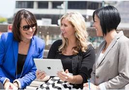 Three Rodan and Fields Consultants talking.
