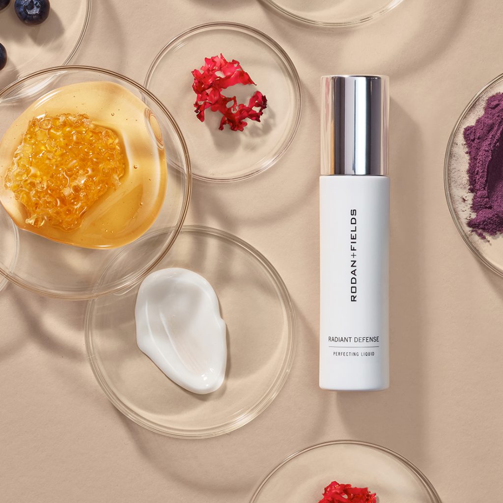 Rodan and Fields Radiant Defense Perfecting Liquid - pictured with pitri dishes of ingredients
