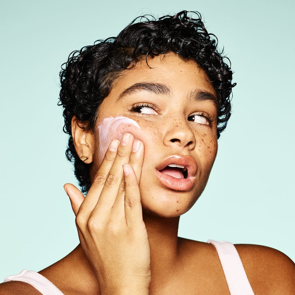Model applying Rodan and Fields product to face
