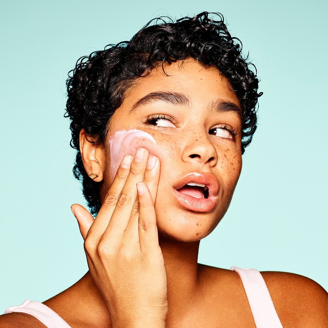 Model applying Rodan and Fields product to face