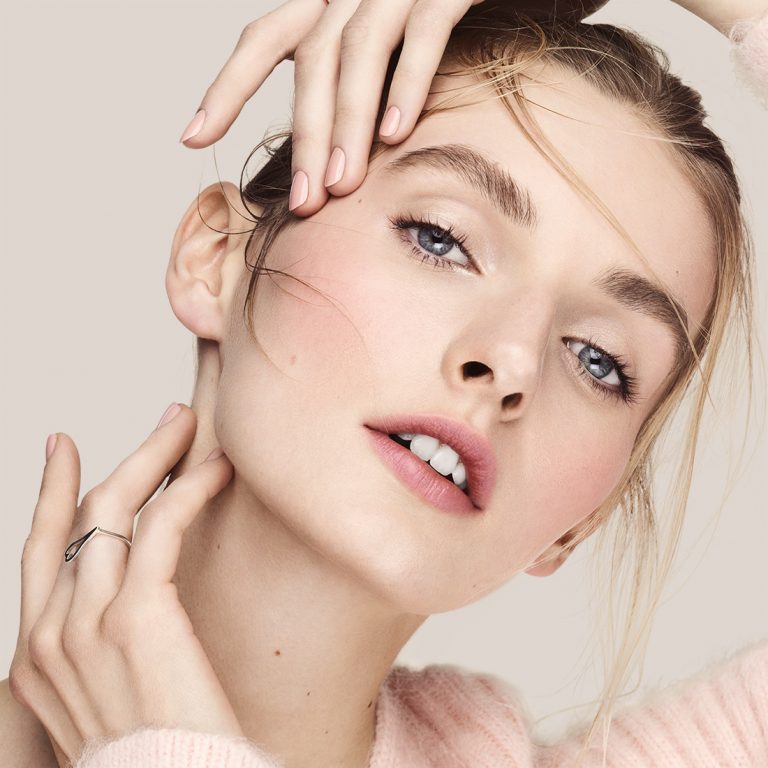 Close shot of light skinned model with natural eyelashes