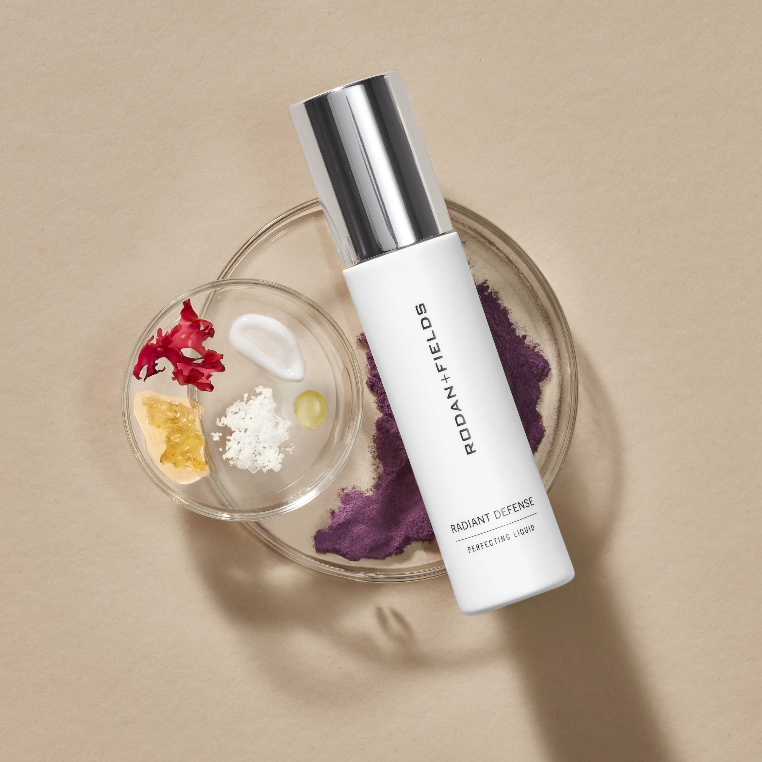 Radiant Defense Perfecting Liquid pictured with ingredients