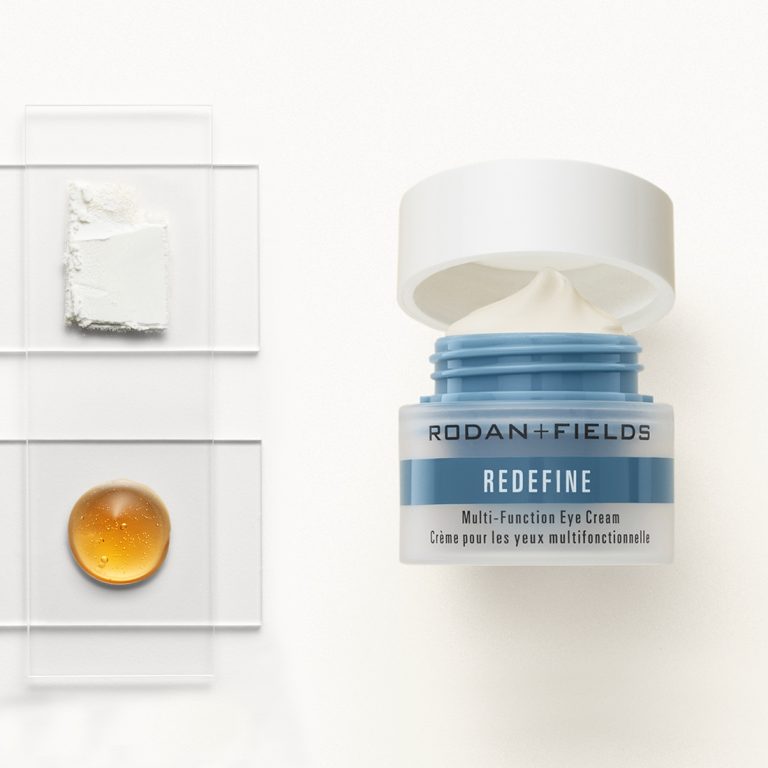 Rodan + Fields Multifunction Eye Cream pictured with ingredient texture swatches
