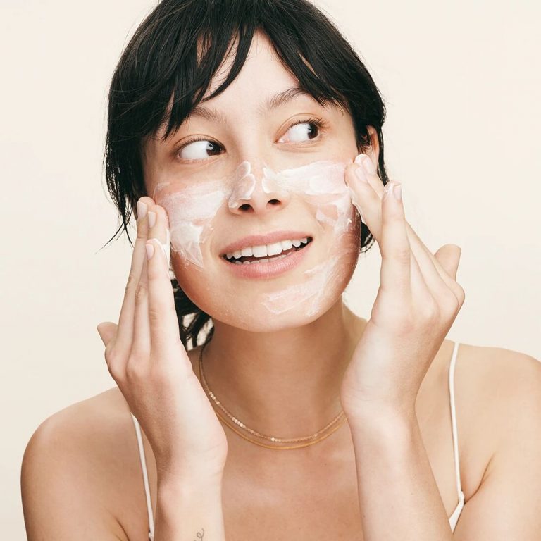 Rodan and fields model applying face wash