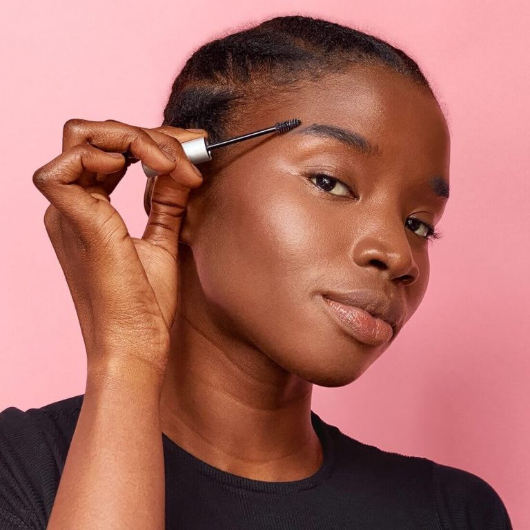 Woman applying Brow Defining Boost