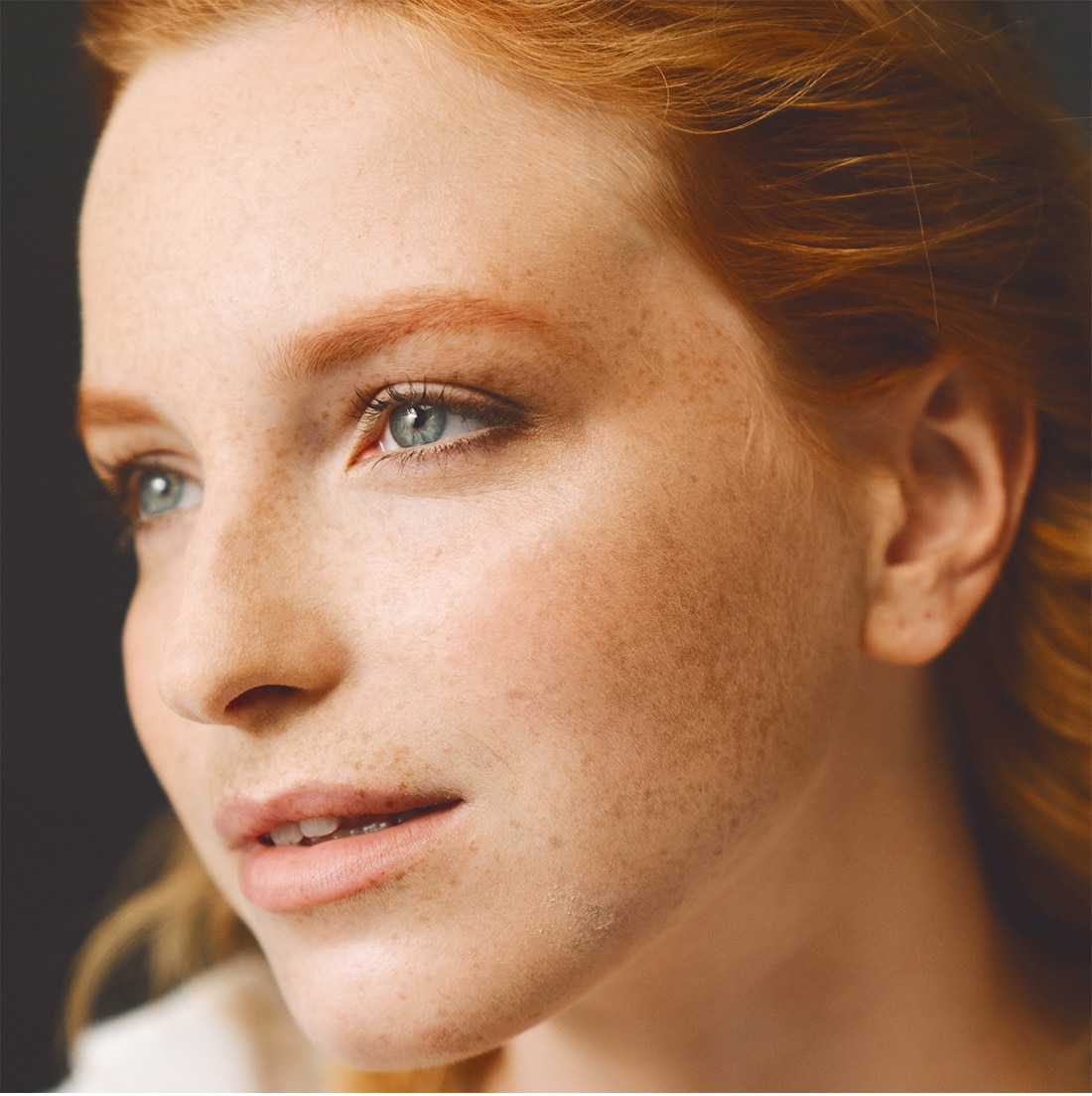 Young woman with freckles