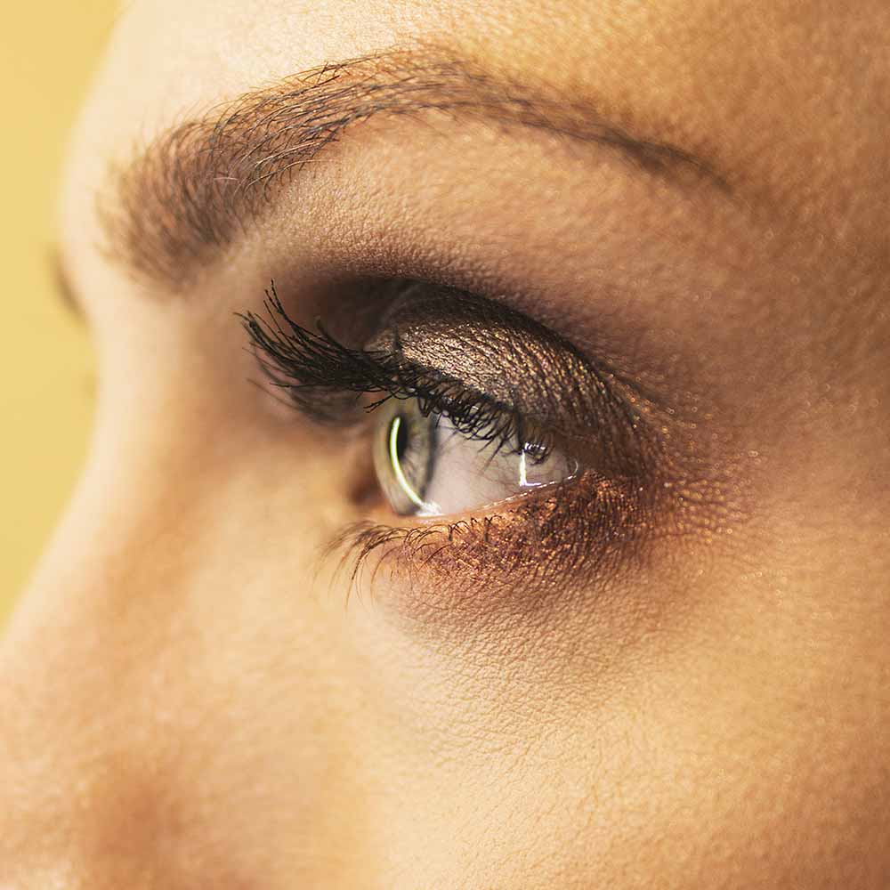 Close up of a woman's eye in profile. Photo by Apostolos Vamvouras